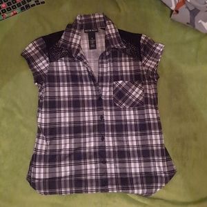 A black plaid knit shirt